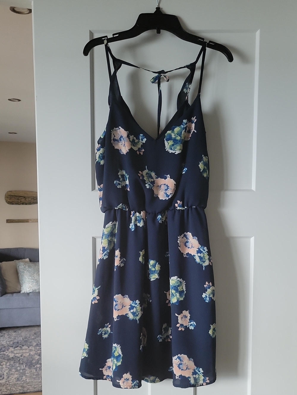 Lush Navy Fabric Garment with Cream Care Tag